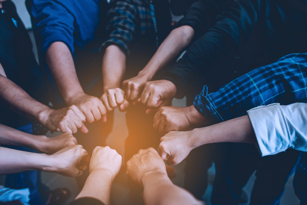 A Team Shaking Hands - Arrow Auto - Automotive Components Suppliers Grand Rapids
